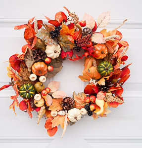 Fall Grapevine Wreath with white and green and orange pumpkins at Elegant Floral Wreaths at Etsy. 